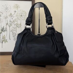 Coach Black Leather Shoulder Bag with kiss lock closure